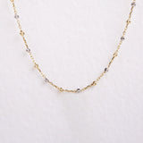 Two-tone bead necklace.